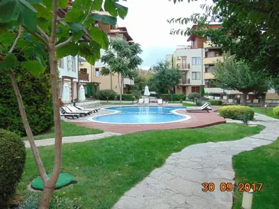 a swimming pool in the middle of a yard at Болгария, г.Свети Влас, к.