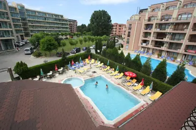 an overhead view of a swimming pool in a resort at Friends Family Hotel in Sunny Beach