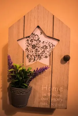 a picture of a star on a wall with a plant at Two Bedroom Apartment Downtown Ivanovi in Varna City