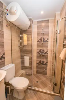 a bathroom with a toilet and a shower at Soulful Apartments - Horizon in Varna City