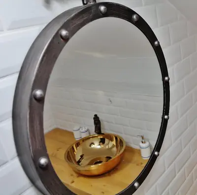 a bathroom mirror with a wooden bowl on a counter at Casa de oro Alma in Sozopol