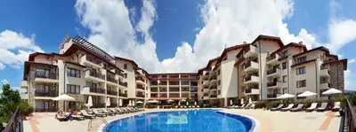 a resort with a swimming pool and some buildings at Relax Holiday Complex & Spa in Sunny Beach