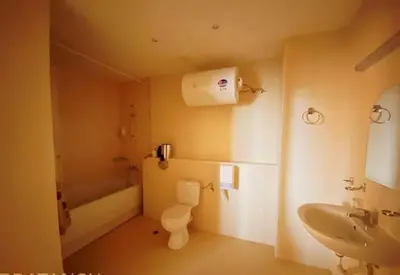 a bathroom with a toilet and a sink at Apartment Konstantin in Trakia Plaza in Sunny Beach