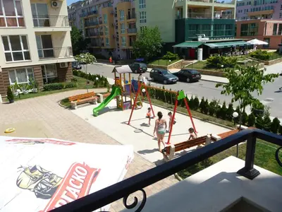 a group of children playing on a playground at Apartments in Casa del Sol in Sunny Beach