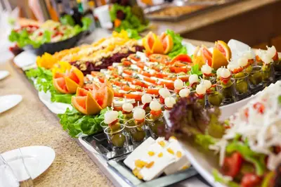 a buffet with many different types of food on a table at Hotel Wela - Premium All Inclusive in Sunny Beach