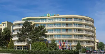 a building with a sign on top of it at Hotel Wela - Premium All Inclusive in Sunny Beach