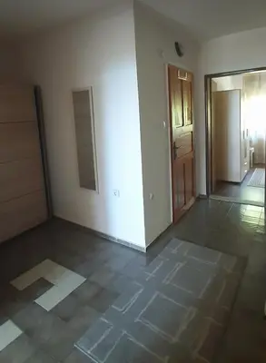 an empty room with a door and a hallway at Tanja in Sveti Vlas