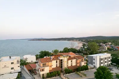an aerial view of a city and the water at Семеен хотел Golden Place in Sozopol