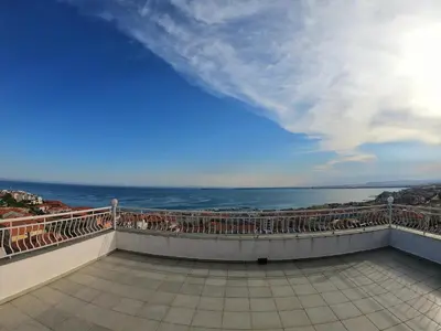 a balcony with a view of the ocean at Apartment in St. Vlas with terrace in Sveti Vlas