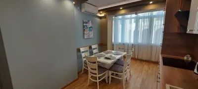 a dining room with a table and chairs at Black Sea View - Luxory apartment by the sea in Burgas City