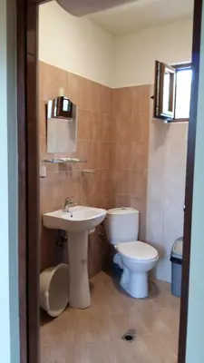 a bathroom with a sink and a toilet at к-г Луна к-с Лонгоза комплекс Лонгоза in Byala