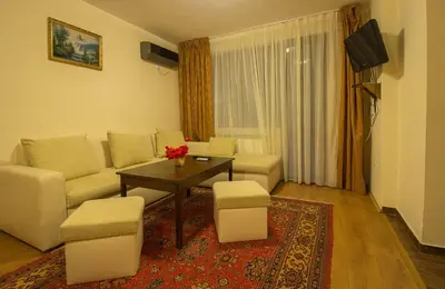 a living room with a couch and a table at к-г Луна к-с Лонгоза комплекс Лонгоза in Byala