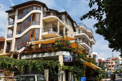 a building with flowers on the side of it at Hotel Morska Zvezda in Sozopol