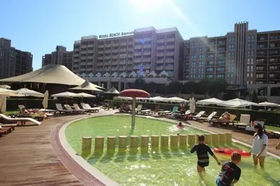 two children playing in a pool in a resort at Apartment in Hotel Royal Beach 5 Pool View in Sunny Beach