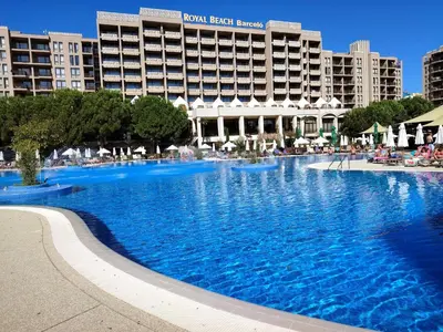a large swimming pool in front of a hotel at Apartment in Hotel Royal Beach 5 Pool View in Sunny Beach