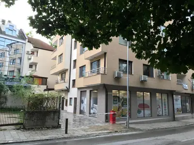 a building on the side of a street at Apartament Odesos in Varna City