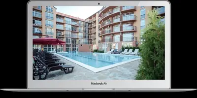 a laptop screen with a picture of a swimming pool at Sanny view South- Студия Мир авангарда in Sunny Beach