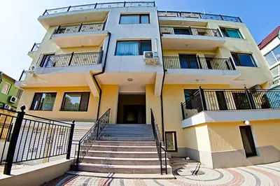 a building with stairs in front of it at Galata in Varna City