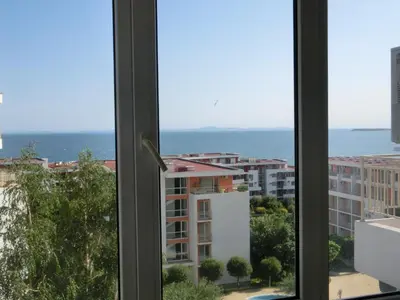 a view of the ocean from a window at Sea View Crown apartment on complex with pools and beach, Sveti Vlas in Sveti Vlas