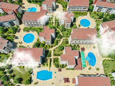 an overhead view of a residential suburb with swimming pools at Nessebar Fort Club Apartments in Sunny Beach