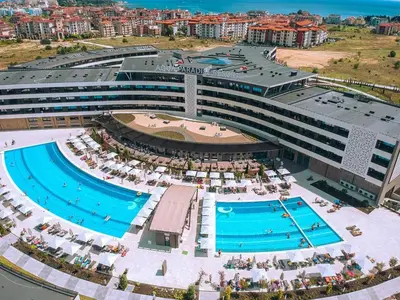 an overhead view of a large building with two pools at Aqua Paradise Resort & Aqua Park in Nesebar