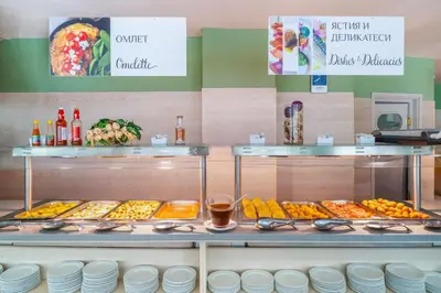 a buffet line with different types of food on display at MPM Hotel Kalina Garden - All Inclusive in Sunny Beach