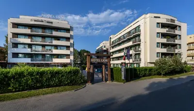 a hotel sign in front of a building at Lion Sunny Beach Hotel in Sunny Beach