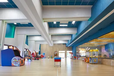 a large room with a play area with a playground at Paradise Beach Residence - Ultra All Inclusive in Sveti Vlas