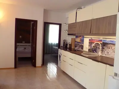 a kitchen with a sink and a counter top at Apartment Tourist Complex Rose Village in Sunny Beach