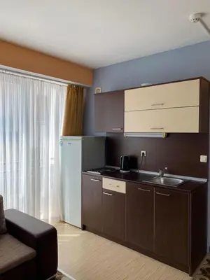 a kitchen with a sink and a counter top at Carina Beach in Sunny Beach