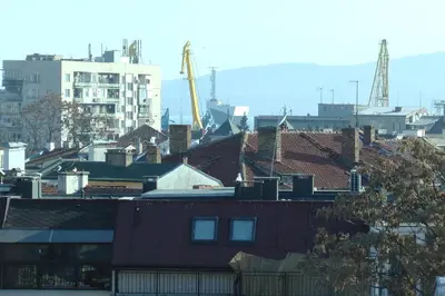 a view of a city with roofs and buildings at TOP CENTER , MODERN AND QUIET APARTMENT in Burgas City