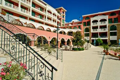 a walkway in front of a building at Saint George Palace Hotel All-inclusive in Sveti Vlas