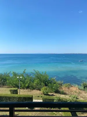 a view of the ocean from a balcony at Dolce Vita Apartment in Sveti Vlas