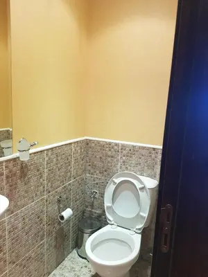 a bathroom with a toilet and a sink at Barcelo SeaView Apartment in Sunny Beach