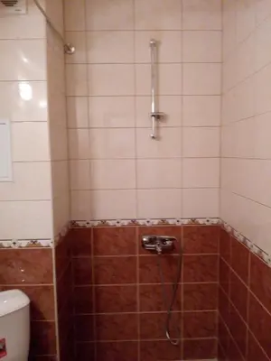 a bathroom with a shower with a toilet at Studio Zlatina in Pomorie