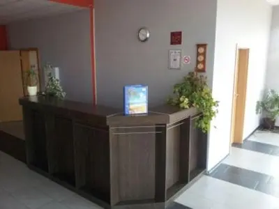 a lobby with a reception desk in a building at Hotel Seasons 2 in Sunny Beach