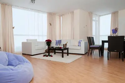 a living room with a couch and a table at Sea Dream Rental Apartments in Varna City