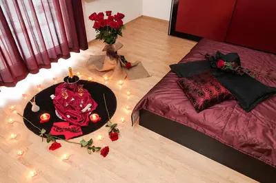 a bedroom with a bed with lights on the floor at Sea Dream Rental Apartments in Varna City