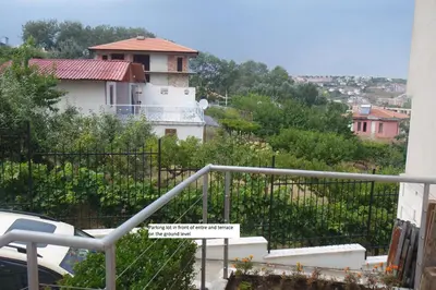a view of a building from the balcony of a house at Fantastic Sea View Sun village Byala in Byala