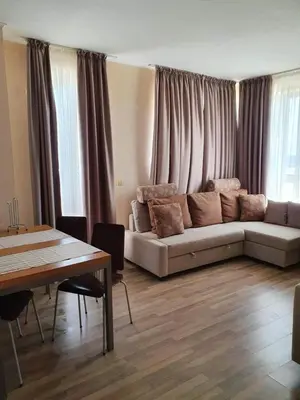a living room with a couch and a table at Apartment with Sea View in Obzor Beach in Obzor