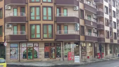 an apartment building on the side of a street at Paradise Day in Pomorie