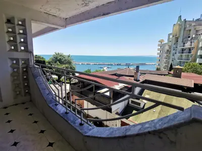 a balcony with a view of the ocean at Lazur SeaView Apartment in Pomorie