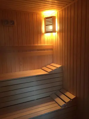 a sauna with a light on the inside of it at Family Hotel Belle Epoque Beach in Varna City