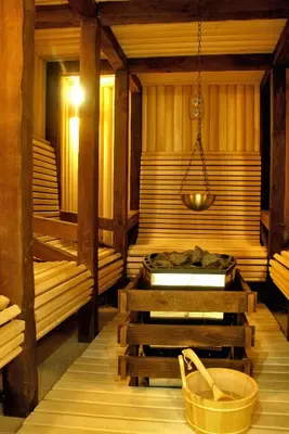 a sauna with two beds and a basket at Eco Complex Sherba in Debelets