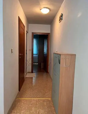 a kitchen with a refrigerator and a hallway at Sozopol House Dimitrovi in Sozopol