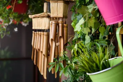 a bunch of wooden bats hanging on a wall at Sky Garden Apartment Burgas in Burgas City