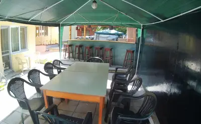 a group of chairs and a table in a tent at Hotel Aia Kavatsi in Sozopol