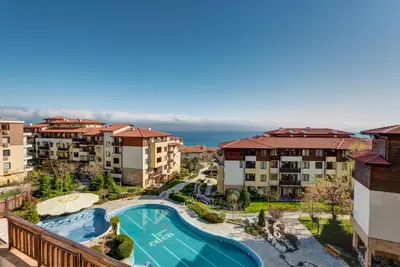 an aerial view of a apartment complex with a swimming pool at ДриймБг Апартаменти - Райска Градина, Свети Влас in Sveti Vlas