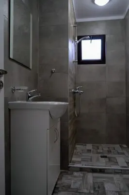 a bathroom with a sink and a shower at Dream View in Byala
