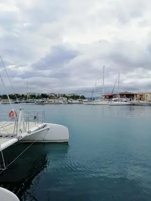 a boat is docked in the water in a harbor at Apartament ,,EDELVAIS- LUX'' in Nesebar
